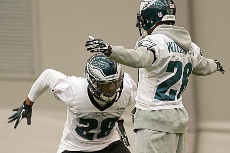 Eagles safety Earl Wolff and cornerback Cary Williams. (Clem Murray/Staff Photographer)