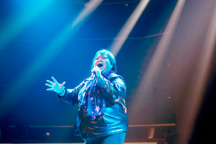 In this Wednesday, Jan. 1, 2014 photo, Rose Fostanes sings during a rehearsal of the X-Factor Israel in Tel Aviv. he 47-year-old Filipino caregiver has emerged as the newest star of Israeli reality television, putting a human face on the thousands of foreign workers who toil away in menial, back-breaking jobs in this country. (AP Photo/Ariel Schalit)