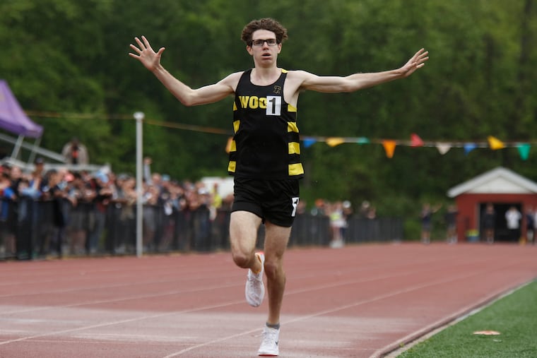 Archbishop Wood’s Gary Martin celebrates after crossing the finish line and becoming the first Pa. high school athlete ever to run a sub-four-minute mile. He ran the mile in 3:57.98 on Saturday, May 14, 2022, at the Catholic League championships at Cardinal O'Hara.