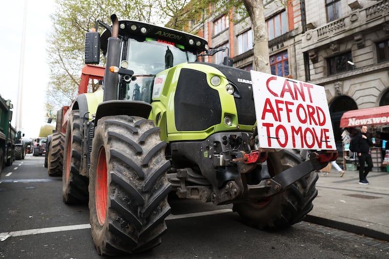 Tractors block O'Connell Street on the fifth day of the National Fuel Protest, in Dublin, Ireland, Saturday, April 11, 2026.