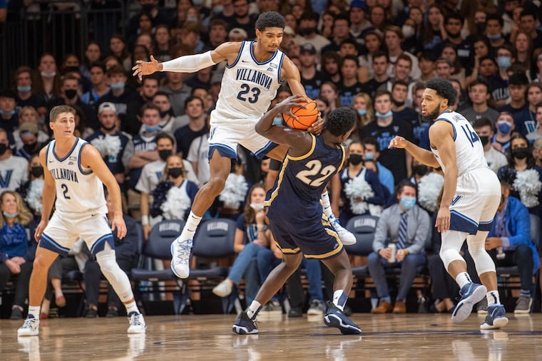 Villanova's Jermaine Samuels leaps as he pursues a rebound against Mount St. Mary's Nana Opoku (22) in the second half.