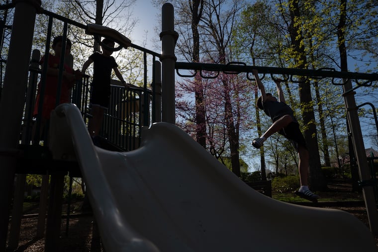 Kids play on the playground at Peacock Park in the Morris Farm neighborhood in Gainesville, Va. MUST CREDIT: Craig Hudson/For The Washington Post