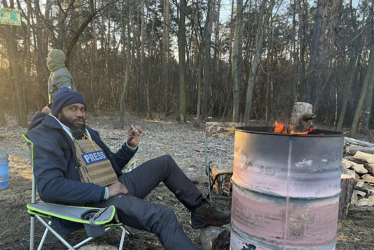 Terrell Jermaine Starr, an independent journalist from the United States, reporting in the field in Brovary, Ukraine, last month.