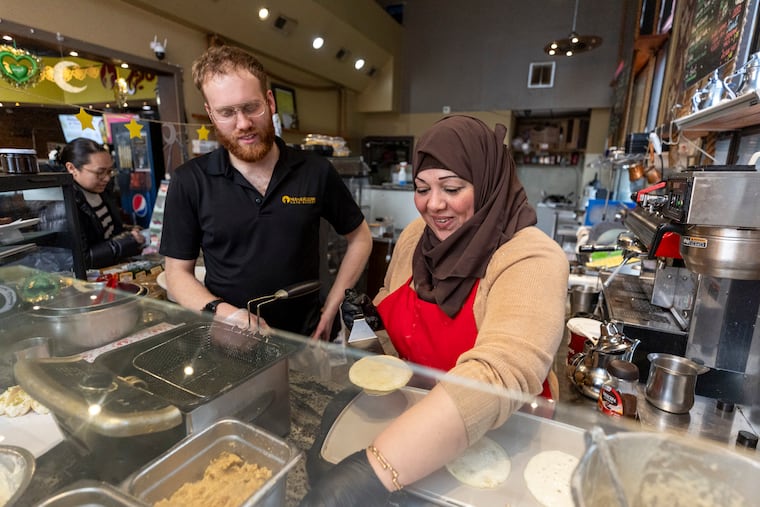 Adam Chatila, General Manager, (left), and Rabab Mohamed, Pastry, Chef, (right), are making their most popular dessert, qatayif, during Ramadan, at Manakeesh in Philadelphia, Pa., on Thursday, Feb. 27, 2025.