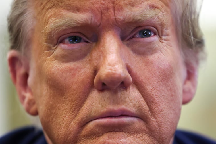 Former President Donald Trump sits in the courtroom before the start of closing arguments in his civil business fraud trial at the New York Supreme Court on Thursday, Jan. 11, 2024.