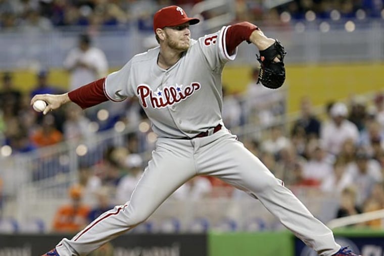 Philadelphia Phillies' Roy Halladay pitches to the Miami Marlins
during the first inning of a baseball game in Miami, Sunday, April 14,
2013. (AP Photo/Alan Diaz)