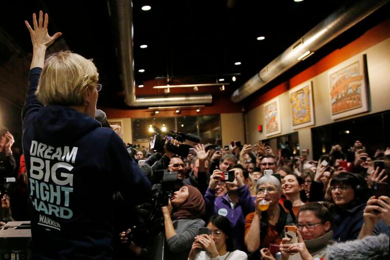 Democratic presidential candidate Sen. Elizabeth Warren (D., Mass.) speaks at a campaign stop at Peace Tree Brewing in Des Moines, Iowa Friday.
