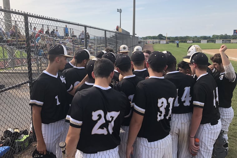 Neumann-Goretti's players huddle during their PIAA Class 2A quarterfinal loss to District 11's Schuylkill Haven.