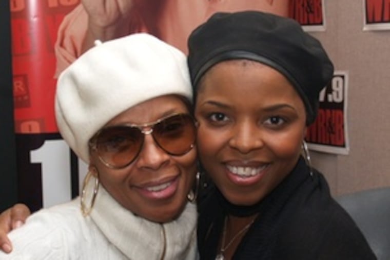 Singer Mary J. Blige (left) with WRNB's Mo'Shay LaRen during a stop at the station last week to discuss her new album, "Growing Pains."