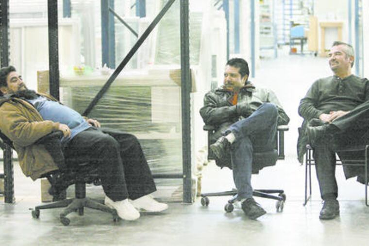 From left, Jesus Juarez, Abelino Gabina and Arturo Garcia at the Republic Windows and Doors factory.