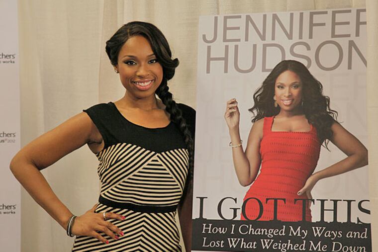 Oscar and Grammy winning performer Jennifer Hudson celebrates the release of her memoir, "I Got This," by signing books at a Weight Watchers Center Tuesday, Jan. 17, 2012 in Chicago. In the book, Jennifer tells the story of her meteoric career rise, how she keeps a level head, and what inspired her amazing weight loss success on the Weight Watchers program. The first 200 fans got the chance to meet Jennifer and get their book autographed. (AP Photo/M. Spencer Green)