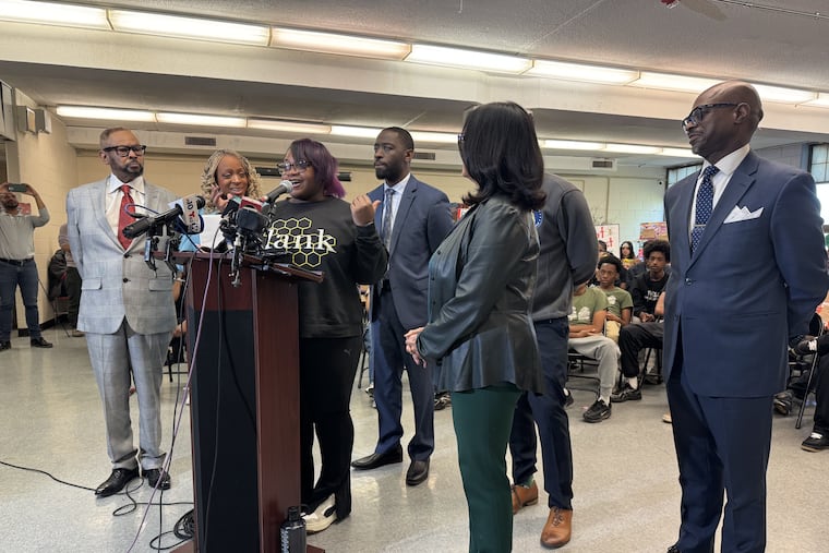 Lankenau High student Wyntir Alford, a 10th grader, speaks at a news conference at her school Tuesday. Alford is surrounded by (from left to right) City Councilmember Curtis Jones Jr., City Councilmember Jamie Gauthier, City Councilmember Nina Ahmad, State Rep. Tarik Khan, and State Rep. Morgan Cephas. All the lawmakers are opposed to the Philadelphia School District's plan to close Lankenau and other schools, and some threatened to withhold district funding over the issue.