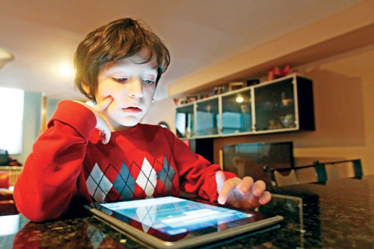 Jacob Weisgold, a kindergartner at St. Peter's School, started playing Words With Friends, a digital adaptation of Scrabble, when he was 5. (Michael Bryant/Staff Photographer)