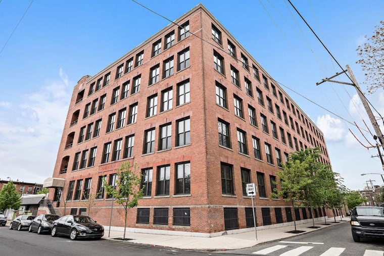 “From the exposed brick and beams to the oversized windows, this loft really complements and allows the building’s character to shine through," said current owner Michael Doctor.