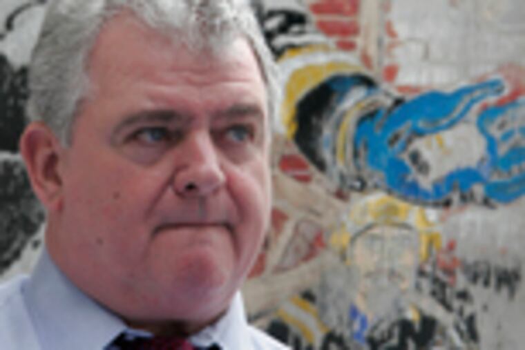 Bob Brady, at a news conference yesterday in Center City, will stay on the ballot after the state Supreme Court declined to hear an appeal by a rival's backers.