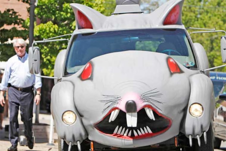 John Dougherty, business manager for Local 98, looks over the union's Ratmobile in Philadelphia on May 2, 2013. They plan to use the rodent-on-wheels at protest sites. (David Maialetti / Staff Photographer)
