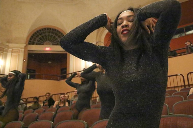A member of the University of the Arts Royals dance squad performs in the audience at the Gershman Y on S. Broad St. in Center City, Philadelphia.