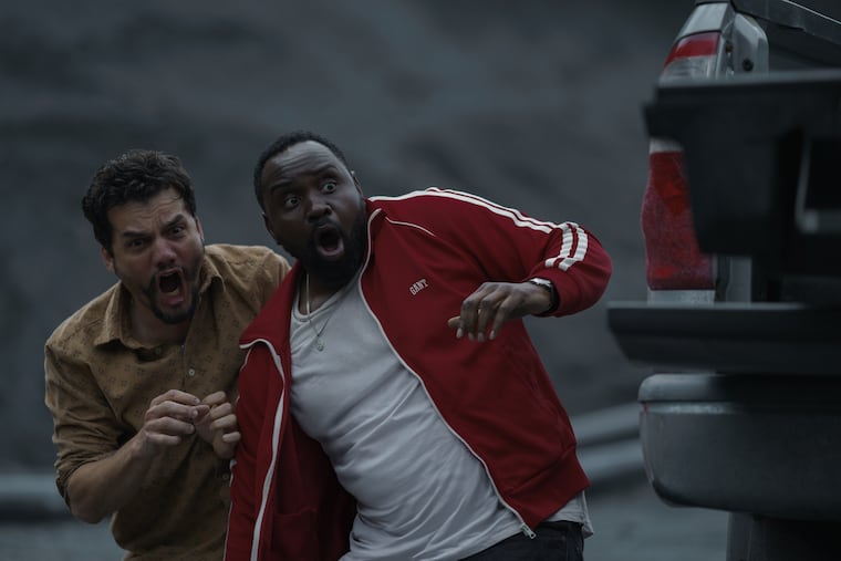 Brian Tyree Henry (right) and Wagner Moura play best friends Ray and Manny in "Dope Thief," airing on Apple TV+.