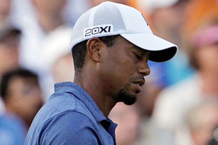 Tiger Woods hit five double bogeys in the PGA Championship golf tournament at Atlanta Athletic Club. (Charlie Riedel/AP Photo)