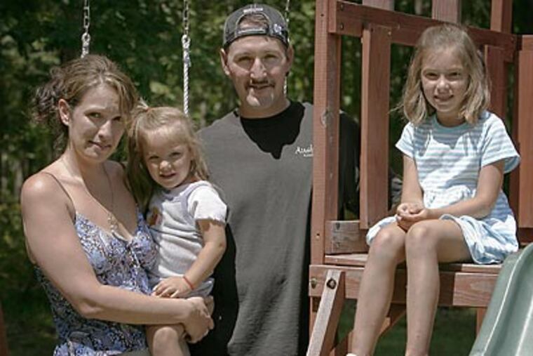 Tina Toy (left) keeps a Web site for Kiddie Kollege parents. (Akira Suwa / Staff Photographer)