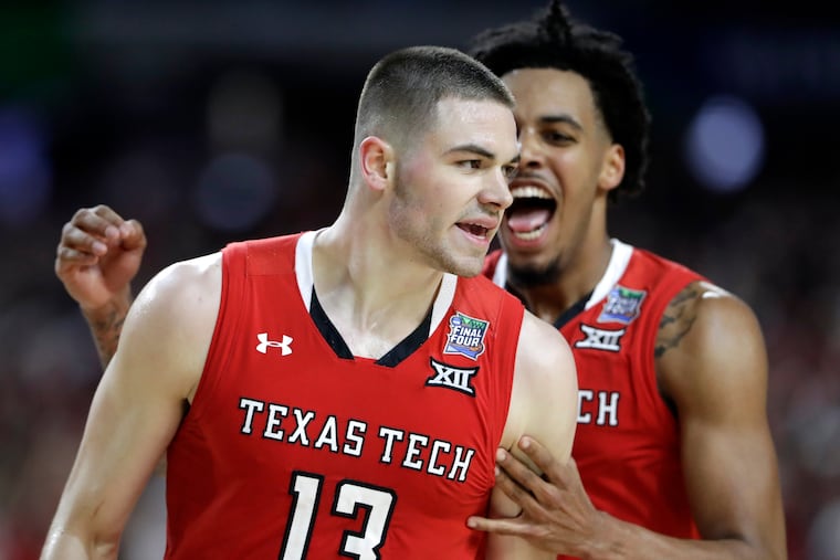 Texas Tech guard Matt Mooney (13) celebrates after making a three-point basket during the second half against Michigan State in the semifinals of the Final Four NCAA college basketball tournament, Saturday, April 6, 2019, in Minneapolis. (AP Photo/Jeff Roberson)