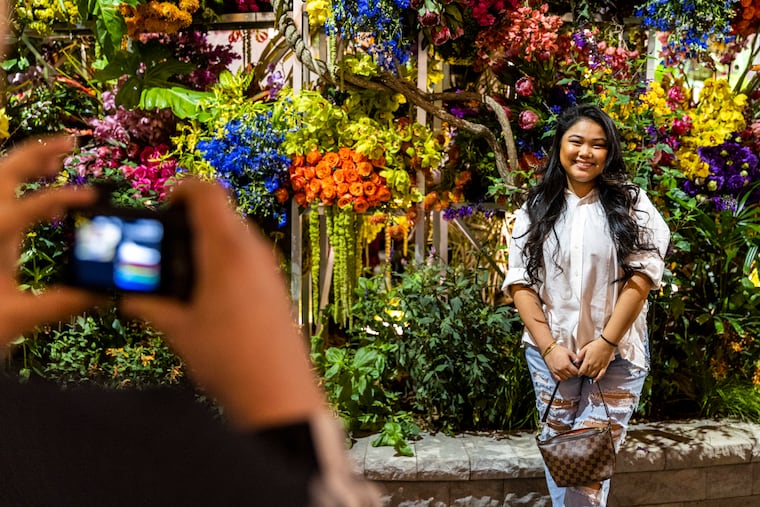 Candice Nguyen, of Williamstown, N.J., is a Philly microinfluencer. Here she poses for a photo taken by her boyfriend, Bobby Monaghan.