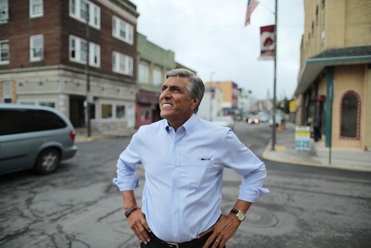 U.S. Rep. Lou Barletta walks through Hazleton, Pa. Barletta is the Republican nominee challenging U.S. Sen. Bob Casey's bid for a third term, Friday July 6., 2018.