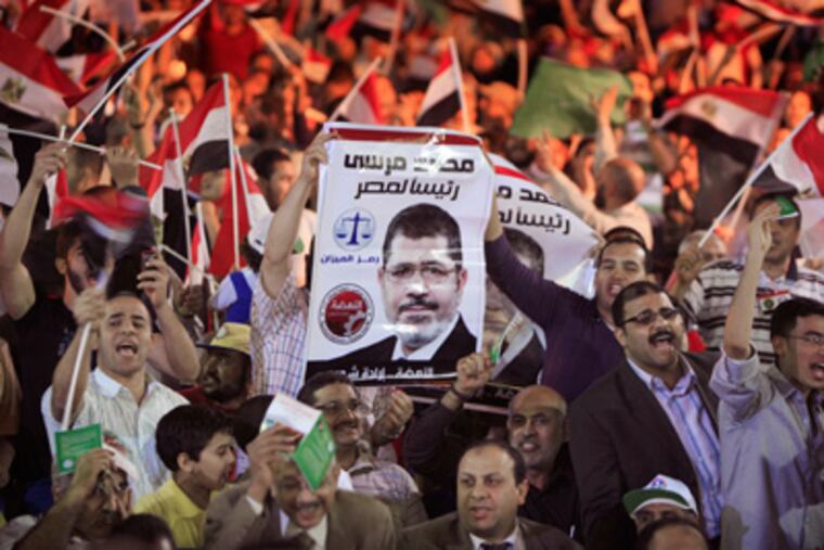 Mohammed Morsi’s Muslim Brotherhood reneged on pledges not to contest more than 30 percent of parliamentary seats and not to field a candidate for president. AMR NABIL / Associated Press, File)
