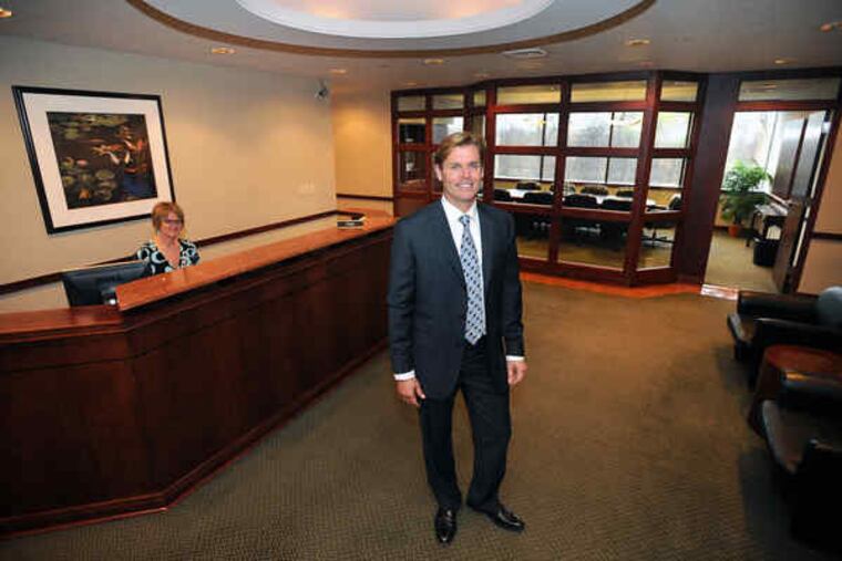 G. Michael Howard, president of American Executive Centers, in the reception area of the firm's King of Prussia virtual offices.