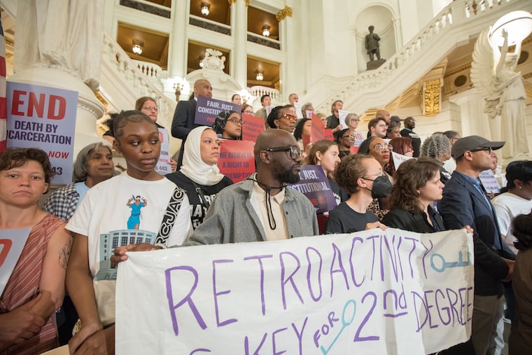 Advocates rally at the Pennsylvania State Capitol in Harrisburg in June for new sentencing guidelines for second-degree murder convictions.