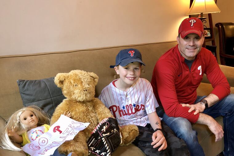 Mike Wang and his birthday-boy son, Elliot, "attend" Game 5 of the Phillies-winning 2008 World Series in their South Philly living room.