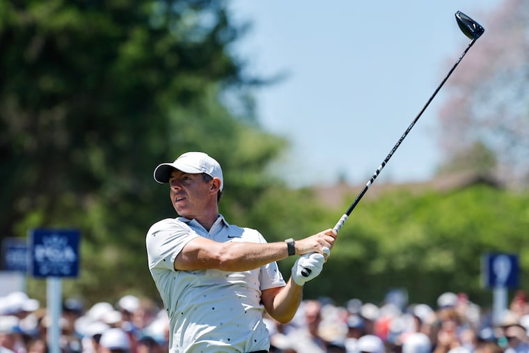 Rory McIlroy tees off at the 11th hole during the third round of the PGA Championship golf tournament at Aronimink Golf Club.