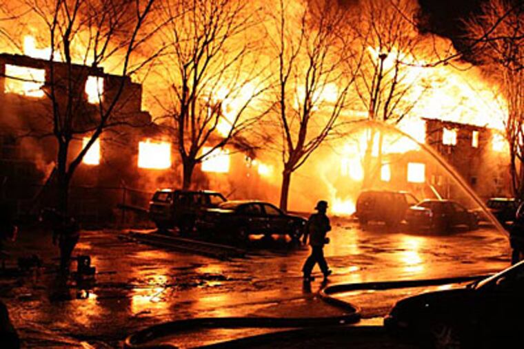 A fire destroyed an apartment building this morning. (Steve Skipton / PhillyFireNews.com)