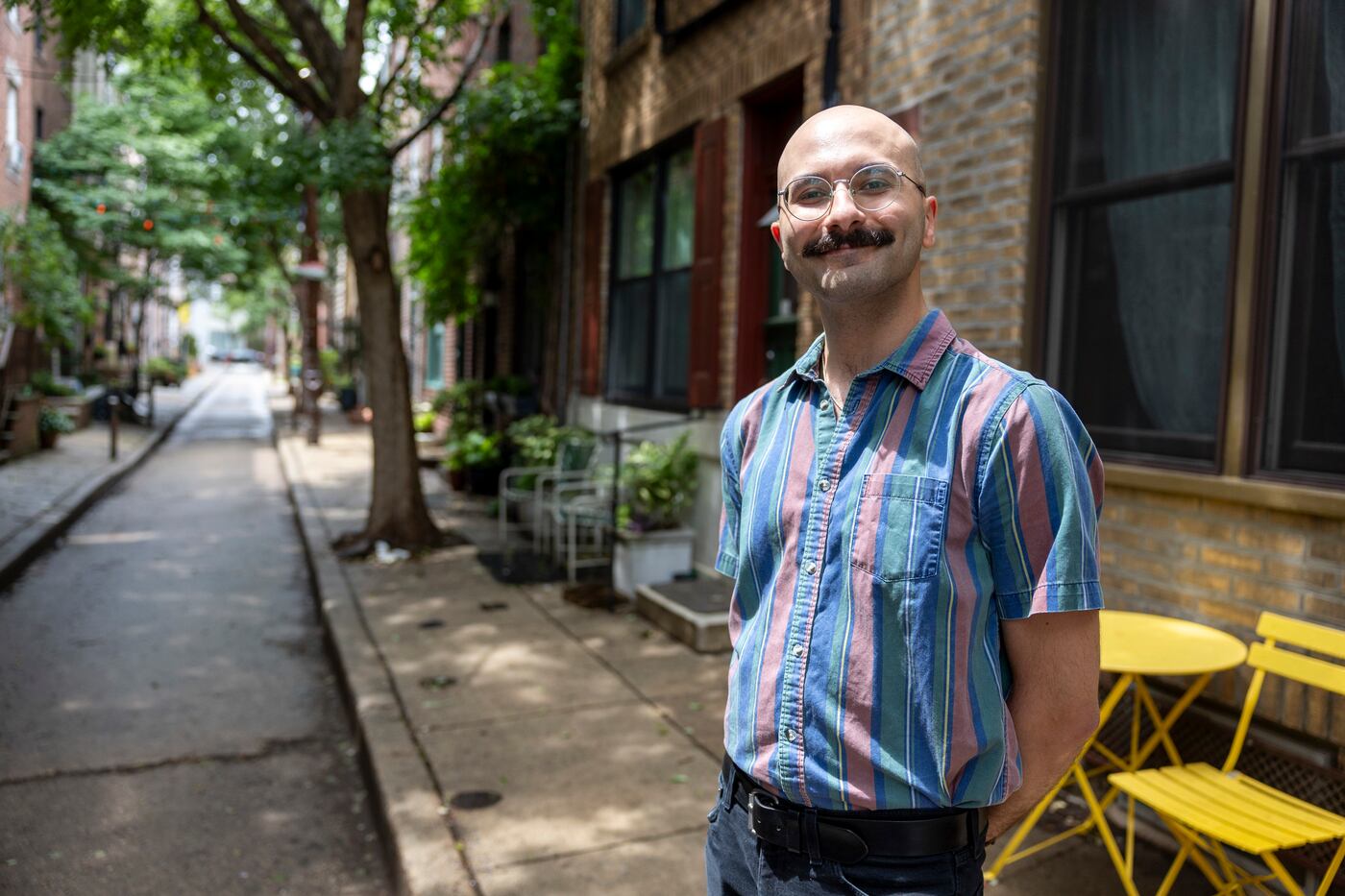 Brendan McCreath poses for a portrait outside his home.