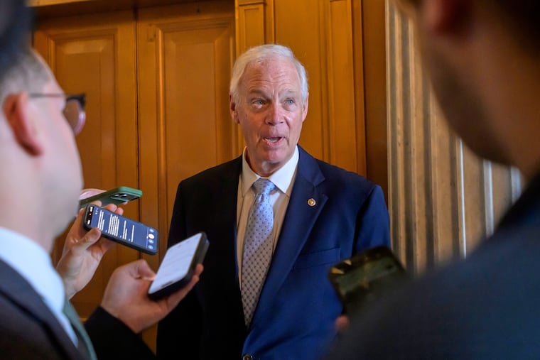 Sen. Ron Johnson (R., Wis.) talks with reporters outside of the Senate chamber during a vote at the U.S. Capitol, Friday, August 7, 2026, in Washington.