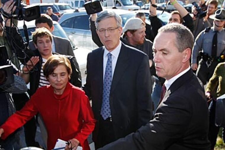 Former Penn State athletic director Tim Curley has been charged with perjury and failure to report. (Matt Rourke/AP)
