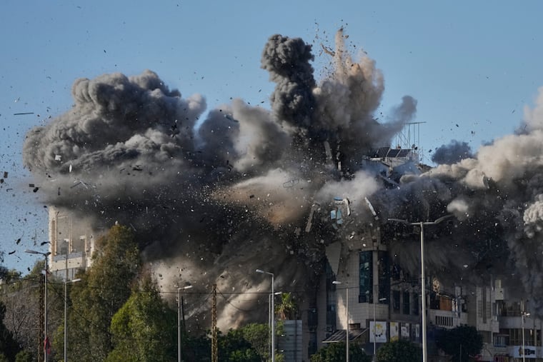 Smoke rises after an Israeli airstrike hits a building near the airport road in Beirut, Lebanon, on Tuesday.