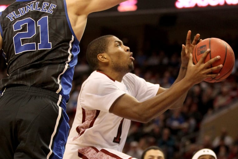 Temple's Khalif Wyatt goes up for a basket in the first half of the Owls' 78-73 victory over Duke at the Wells Fargo Center.