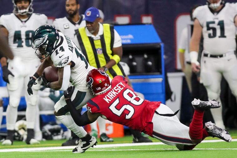Philadelphia Eagles running back Kenneth Gainwell gets tackled by Houston Texans linebacker Christian Kirksey during the first quarter as the Eagles play the Texas at NRG Stadium in Houston, TX, on Thursday, Nov. 3, 2022, in Houston.