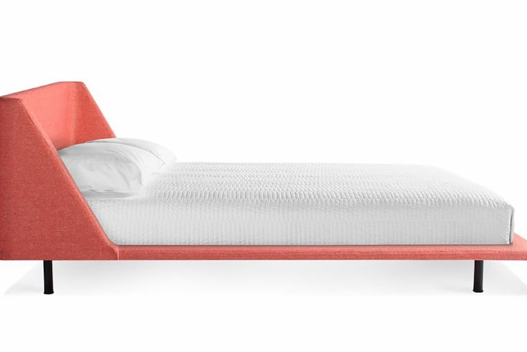 Pink power: Blu Dot’s nook bed has a padded frame that comes in seven soft colors, $1,799, bludot.com. (Blu Dot/TNS)