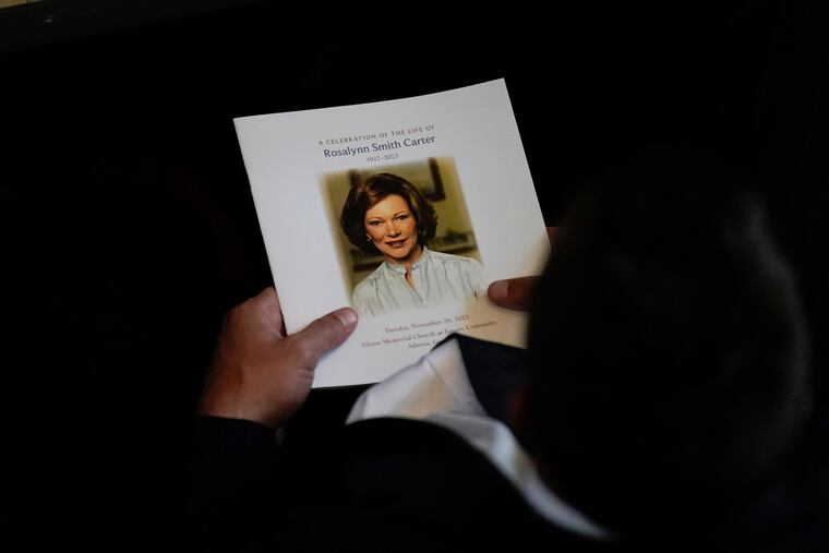 Attendees are seated before a tribute service for former first lady Rosalynn Carter at Glenn Memorial Church on Tuesday in Atlanta.
