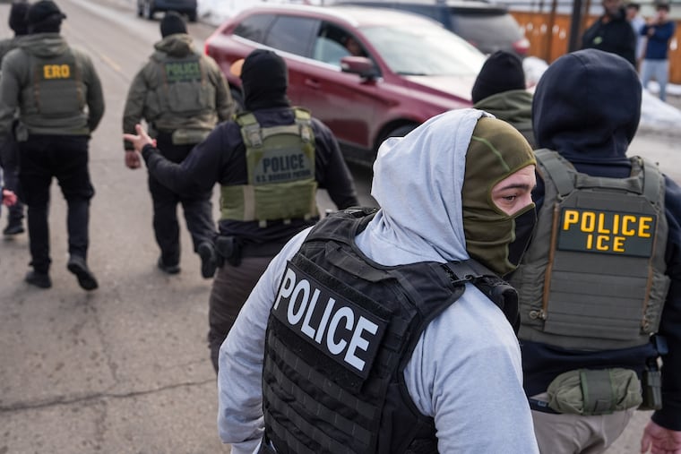Opponents say that masks worn by federal immigration agents are intended to intimidate.