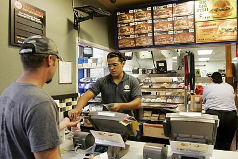 Many Americans don't know how their food is produced. (Wilfredo Lee/AP file photo)