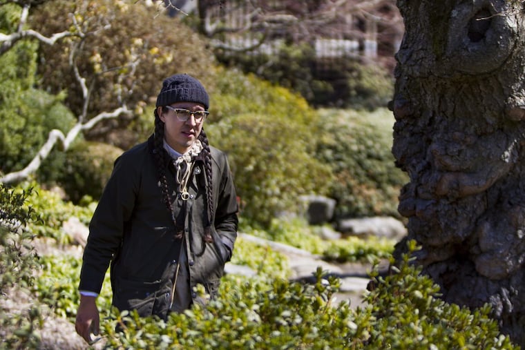 Head gardener Sandi Polyakov walks through the grounds at Shofuso Japanese House and Garden.