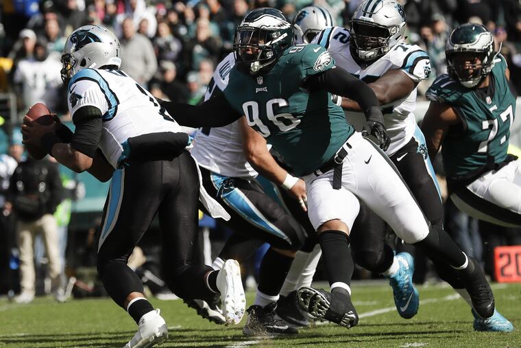 Eagles defensive end Derek Barnett goes after Carolina Panthers quarterback Cam Newton on Sunday, October 21, 2018 in Philadelphia. YONG KIM / Staff Photographer
