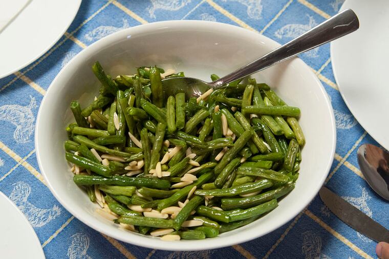 The side dish -- green beans and almonds -- to go with the main meal of quesadillas at the third week of My Daughter's Kitchen at Wiggins Elementary School in Camden on October 29, 2015. ( CLEM MURRAY / Staff Photographer )