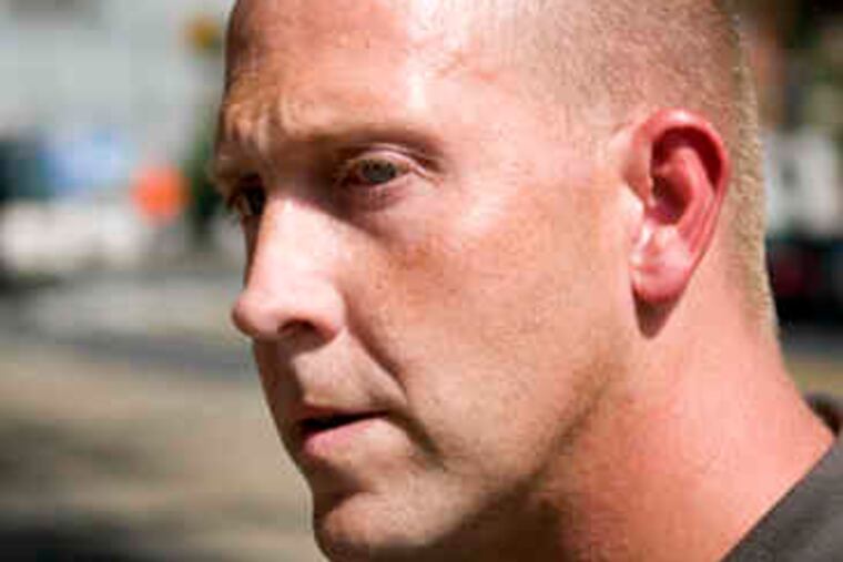 Discussing verdict (from left): juror Merrill Arbogast, attorneys Jason Gosselin and Bill McSwain.