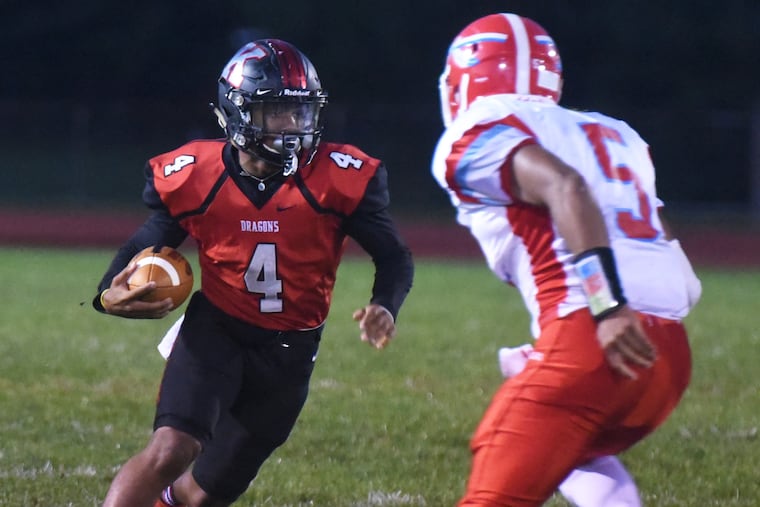 Kingsway's A.J. Butler runs in the first quarter. He scored two touchdowns in the second half.