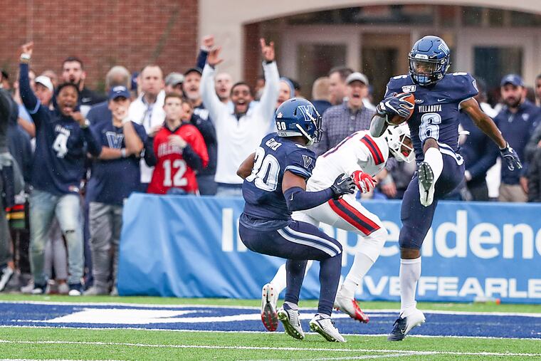 Villanova defensive back Jaquan Amos intercepts his third pass of the season against Stony Brook University.