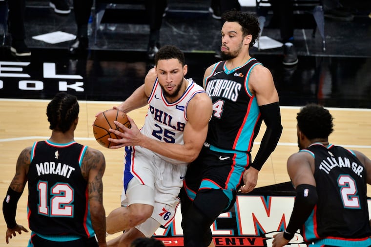 Philadelphia 76ers guard Ben Simmons (25) handles the ball as Memphis Grizzlies guard Dillon Brooks defends during the second half of an NBA basketball game Saturday, Jan. 16, 2021, in Memphis, Tenn.